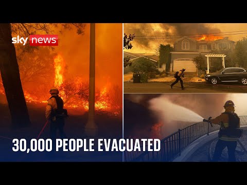 Wildfire sweeping exclusive Los Angeles hillside dotted with celebrity homes