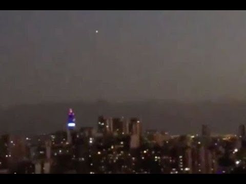 Amazing moment &#039;UFO&#039; dances across a city sky to leave witnesses stunned but it&#039;s not what it seems